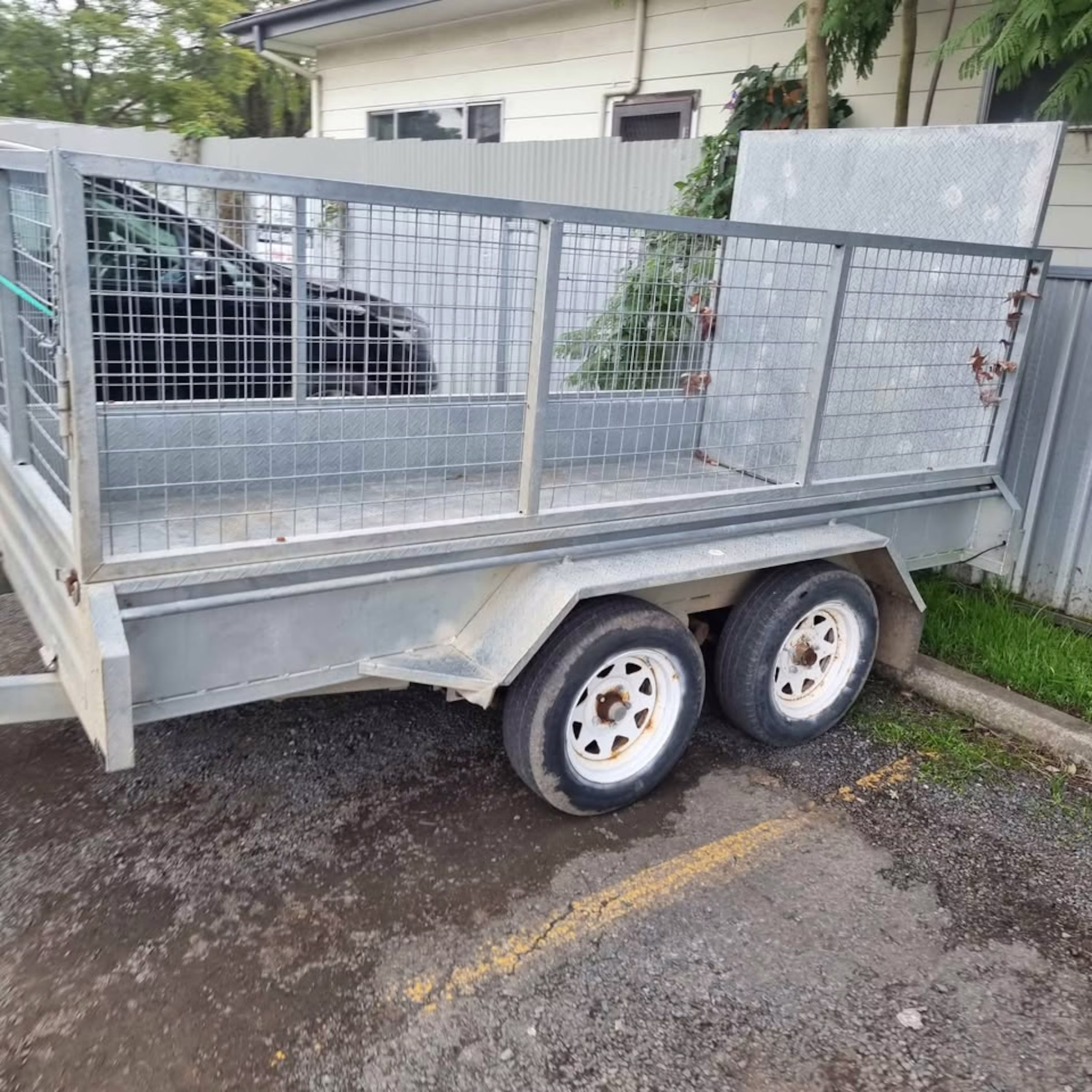 10x5 Cage Trailer with Drop-Down Ramp